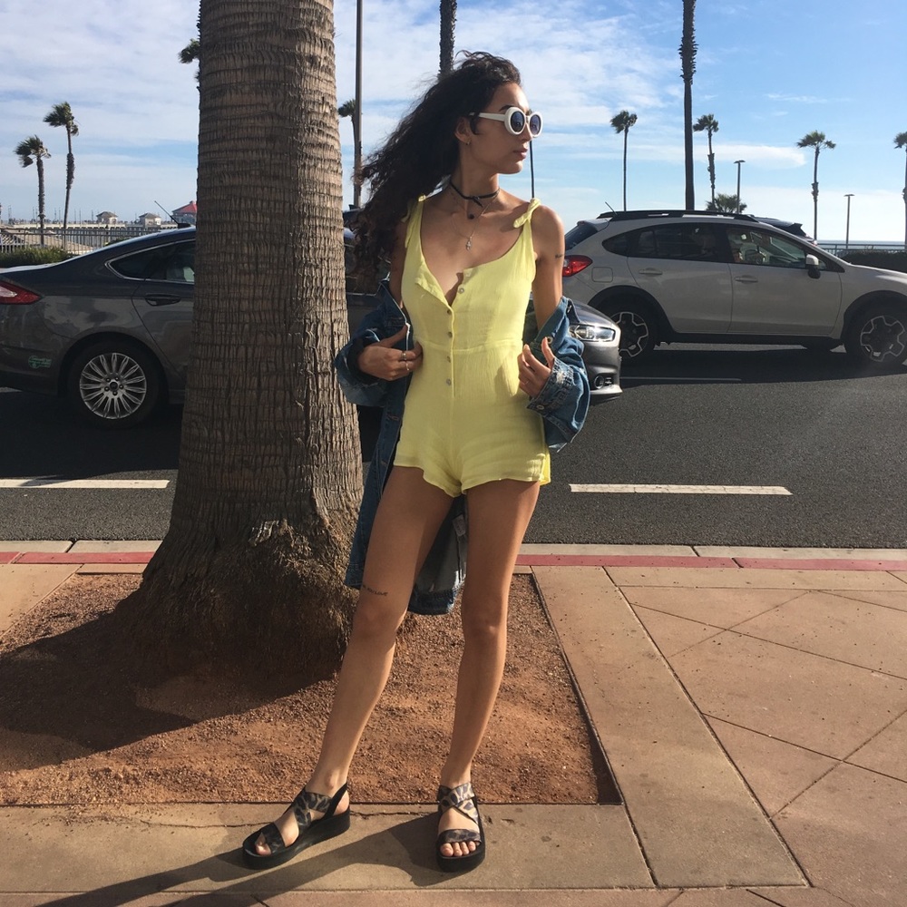 adorable pastel yellow romper